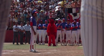 Movie still from “Brewster's Millions” (1985), directed by Walter Hill – A crowd of people watching a baseball game; Extreme Wide shot, High angle