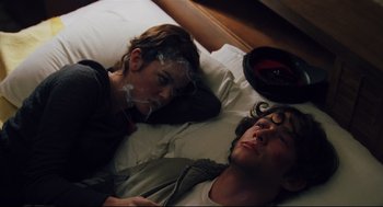 Movie still from “Brick” (2005), directed by Rian Johnson – A man and a woman laying in a bed; Close Up shot, Overhead angle
