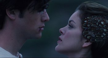Movie still from “Brick” (2005), directed by Rian Johnson – A man and a woman face to face in the dark; Close Up shot, Low angle