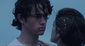 Movie still from “Brick” (2005), directed by Rian Johnson – A man and a woman face to face; Close Up shot, Low angle