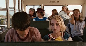 Movie still from “Bridge to Terabithia” (2007), directed by Gabor Csupo – A group of people sitting on a bus; Medium shot, Over the shoulder angle