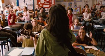 Movie still from “Bridge to Terabithia” (2007), directed by Gabor Csupo – A group of children sitting in a classroom together; Medium shot, Over the shoulder angle
