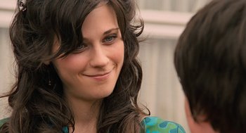 Movie still from “Bridge to Terabithia” (2007), directed by Gabor Csupo – A person with long black hair; Close Up shot, Over the shoulder angle