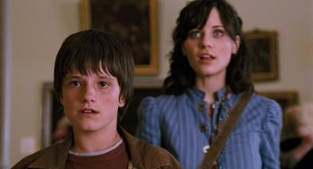 Movie still from “Bridge to Terabithia” (2007), directed by Gabor Csupo – A young boy and a young woman standing next to each other; Close Up shot, Low angle