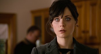 Movie still from “Bridge to Terabithia” (2007), directed by Gabor Csupo – A person wearing a suit; Close Up shot, Over the shoulder angle