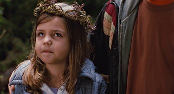 Movie still from “Bridge to Terabithia” (2007), directed by Gabor Csupo – A little girl wearing a crown of berries; Close Up shot, Over the shoulder angle