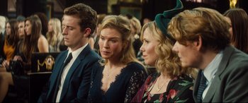 Movie still from “Bridget Jones's Baby” (2016), directed by Sharon Maguire – A group of people sitting next to each other in a room; Medium shot, High angle
