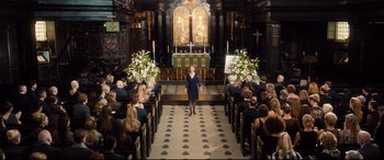 Movie still from “Bridget Jones's Baby” (2016), directed by Sharon Maguire – A woman standing in front of an altar in a church; Extreme Wide shot, High angle