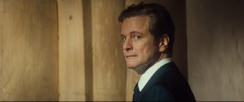 Movie still from “Bridget Jones's Baby” (2016), directed by Sharon Maguire – A person wearing a suit and tie; Close Up shot, Low angle