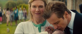 Movie still from “Bridget Jones's Baby” (2016), directed by Sharon Maguire – A man and a woman standing next to each other; Close Up shot, Over the shoulder angle