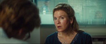 Movie still from “Bridget Jones's Baby” (2016), directed by Sharon Maguire – A person looking at the camera; Close Up shot, Over the shoulder angle