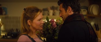 Movie still from “Bridget Jones's Baby” (2016), directed by Sharon Maguire – A man and a woman standing next to each other; Close Up shot, Over the shoulder angle