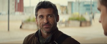 Movie still from “Bridget Jones's Baby” (2016), directed by Sharon Maguire – A person wearing a jacket; Close Up shot, Over the shoulder angle