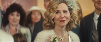 Movie still from “Bridget Jones's Baby” (2016), directed by Sharon Maguire – A person wearing a necklace; Close Up shot, Over the shoulder angle