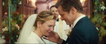 Movie still from “Bridget Jones's Baby” (2016), directed by Sharon Maguire – A man and a woman smiling at each other; Close Up shot, Over the shoulder angle