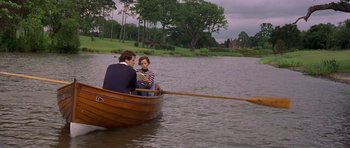 Movie still from “Bridget Jones's Diary” (2001), directed by Sharon Maguire – A man and a woman are in a boat on the water; Wide shot, High angle