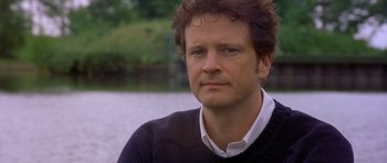 Movie still from “Bridget Jones's Diary” (2001), directed by Sharon Maguire – A person wearing a shirt and a sweater; Close Up shot, Over the shoulder angle