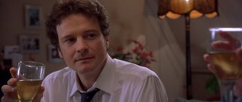 Movie still from “Bridget Jones's Diary” (2001), directed by Sharon Maguire – A person wearing a shirt and a tie; Close Up shot, Over the shoulder angle