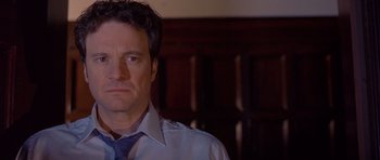Movie still from “Bridget Jones's Diary” (2001), directed by Sharon Maguire – A person wearing a shirt and a tie; Close Up shot, Low angle