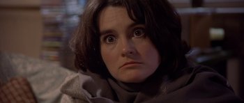 Movie still from “Bridget Jones's Diary” (2001), directed by Sharon Maguire – A person wearing a scarf; Close Up shot, High angle