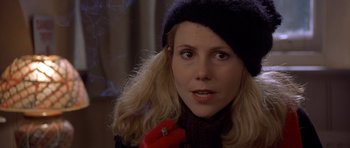 Movie still from “Bridget Jones's Diary” (2001), directed by Sharon Maguire – A person wearing a hat; Close Up shot, Over the shoulder angle