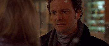 Movie still from “Bridget Jones's Diary” (2001), directed by Sharon Maguire – A person wearing a sweater; Close Up shot, Over the shoulder angle