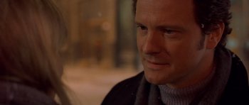 Movie still from “Bridget Jones's Diary” (2001), directed by Sharon Maguire – A person wearing a sweater; Close Up shot, Over the shoulder angle