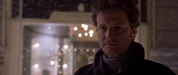 Movie still from “Bridget Jones's Diary” (2001), directed by Sharon Maguire – A person wearing a jacket; Close Up shot, Over the shoulder angle