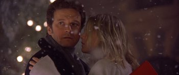 Movie still from “Bridget Jones's Diary” (2001), directed by Sharon Maguire – A man and a woman standing next to each other in the snow; Close Up shot, Over the shoulder angle