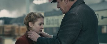 Movie still from “The Book Thief” (2013), directed by Brian Percival – An older man and a young girl looking at each other; Close Up shot, Over the shoulder angle