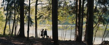 Movie still from “The Book Thief” (2013), directed by Brian Percival – A man and a woman walking through the woods; Extreme Wide shot, High angle
