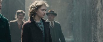 Movie still from “The Book Thief” (2013), directed by Brian Percival – A young girl and a man walking in the fog; Close Up shot, Over the shoulder angle