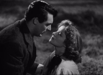 Movie still from “Bringing Up Baby” (1938), directed by Howard Hawks – A man and a woman looking into each others eyes; Close Up shot, Low angle