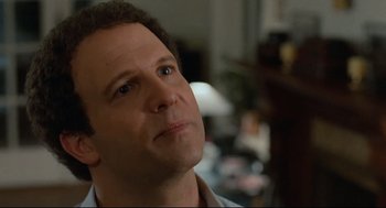 Movie still from “Broadcast News” (1987), directed by James L. Brooks – A person looking up at something; Close Up shot, Over the shoulder angle