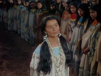 Movie still from “Broken Arrow” (1950), directed by Delmer Daves – A group of native american women standing next to each other; Medium shot, High angle
