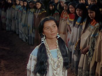 Movie still from “Broken Arrow” (1950), directed by Delmer Daves – A group of native american women standing next to each other; Medium shot, High angle
