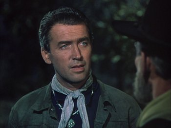 Movie still from “Broken Arrow” (1950), directed by Delmer Daves – A person wearing a cowboy hat; Close Up shot, Over the shoulder angle