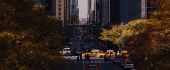 Movie still from “Broken City” (2013), directed by Allen Hughes – A city street filled with lots of traffic; Extreme Wide shot, High angle