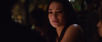 Movie still from “Broken City” (2013), directed by Allen Hughes – A person sitting in a room; Close Up shot, Over the shoulder angle