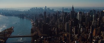 Movie still from “Broken City” (2013), directed by Allen Hughes – An aerial view of a large city with skyscrapers; Extreme Wide shot, High angle