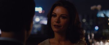 Movie still from “Broken City” (2013), directed by Allen Hughes – A person with a city in the background; Close Up shot, Over the shoulder angle