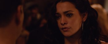 Movie still from “Broken City” (2013), directed by Allen Hughes – A person with long hair; Close Up shot, Over the shoulder angle