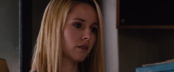 Movie still from “Broken City” (2013), directed by Allen Hughes – A person with long hair; Close Up shot, Over the shoulder angle