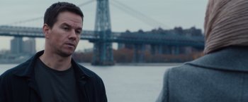 Movie still from “Broken City” (2013), directed by Allen Hughes – A man and a woman standing next to each other near a river; Close Up shot, Over the shoulder angle