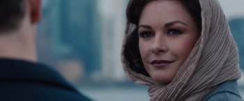 Movie still from “Broken City” (2013), directed by Allen Hughes – A person wearing a scarf; Close Up shot, Over the shoulder angle