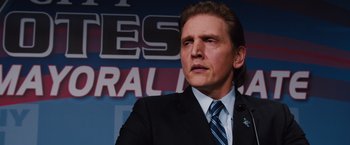 Movie still from “Broken City” (2013), directed by Allen Hughes – A person wearing a suit and tie; Close Up shot, Low angle