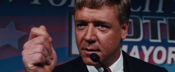 Movie still from “Broken City” (2013), directed by Allen Hughes – A person wearing a suit and tie; Close Up shot, Low angle