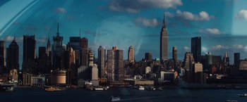 Movie still from “Broken City” (2013), directed by Allen Hughes – A view of a city skyline from across the water; Extreme Wide shot, Low angle