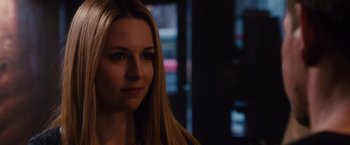 Movie still from “Broken City” (2013), directed by Allen Hughes – A beautiful young woman with long blonde hair; Close Up shot, Over the shoulder angle