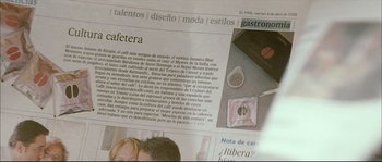 Movie still from “Broken Embraces” (2009), directed by Pedro Almodóvar – A page of a spanish newspaper; Extreme Close Up shot, Overhead angle
